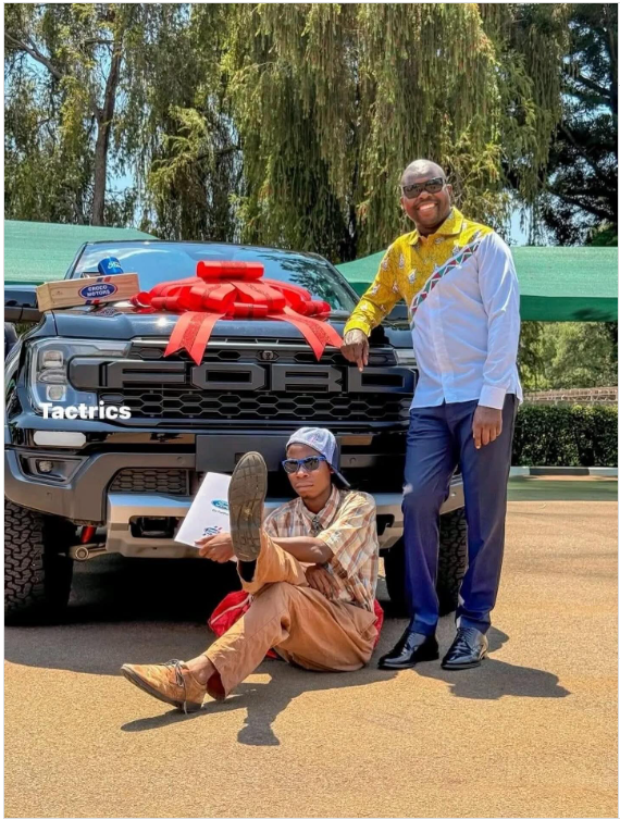 Comic Elder celebrating his new car